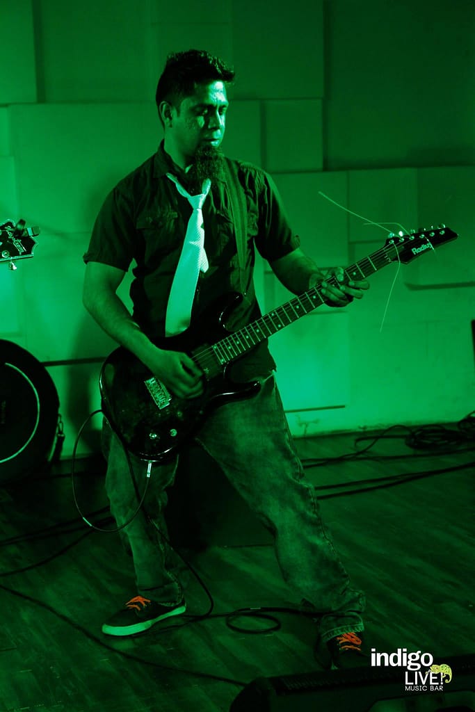 Eric Rodrigues playing Guitar on stage at Indigo Live Bangalore