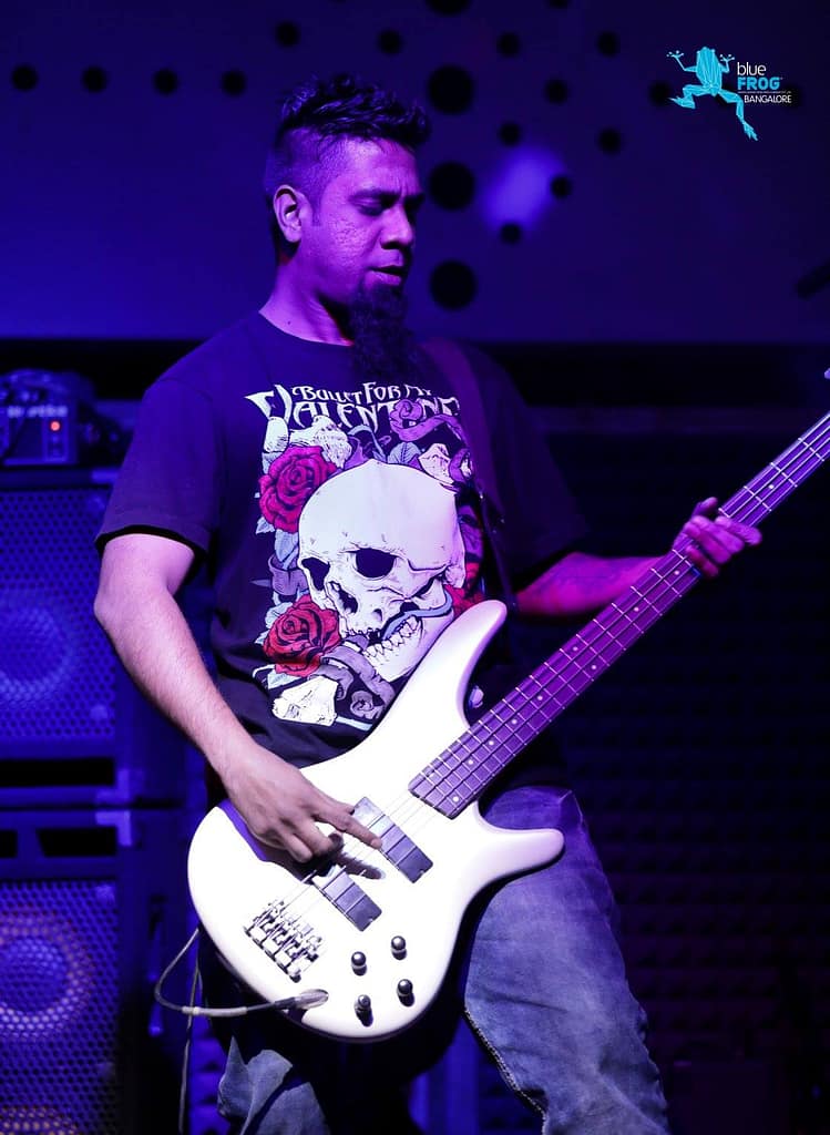 Eric Rodrigues on stage at Blue Frog performing for Ledge 13 as a Bass Guitarist