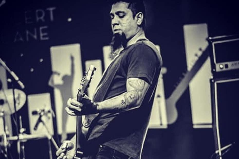 Eric Rodrigues performing Guitar on stage